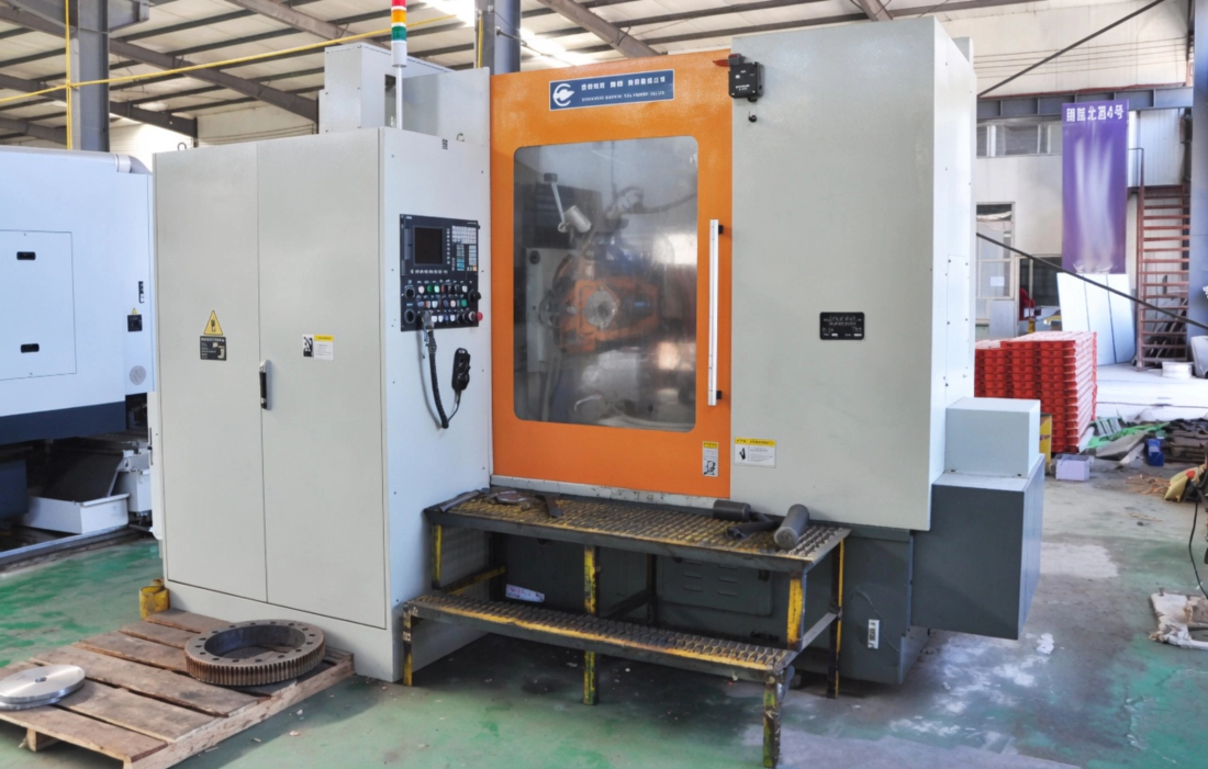 Gear grinding machine producing DIN Class 5 accuracy gears for mill drives